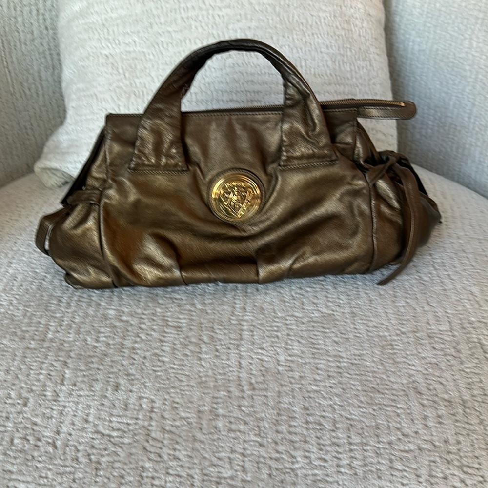 Gorgeous vintage Gucci Hysteria hobo. Metallic gold